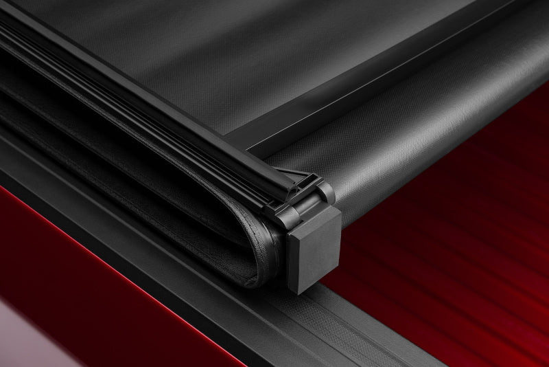 Lund 2019 RAM 1500 (5.5ft Bed w/o RamBox Cargo Mgmt) Genesis Tri-Fold Tonneau Cover - Black